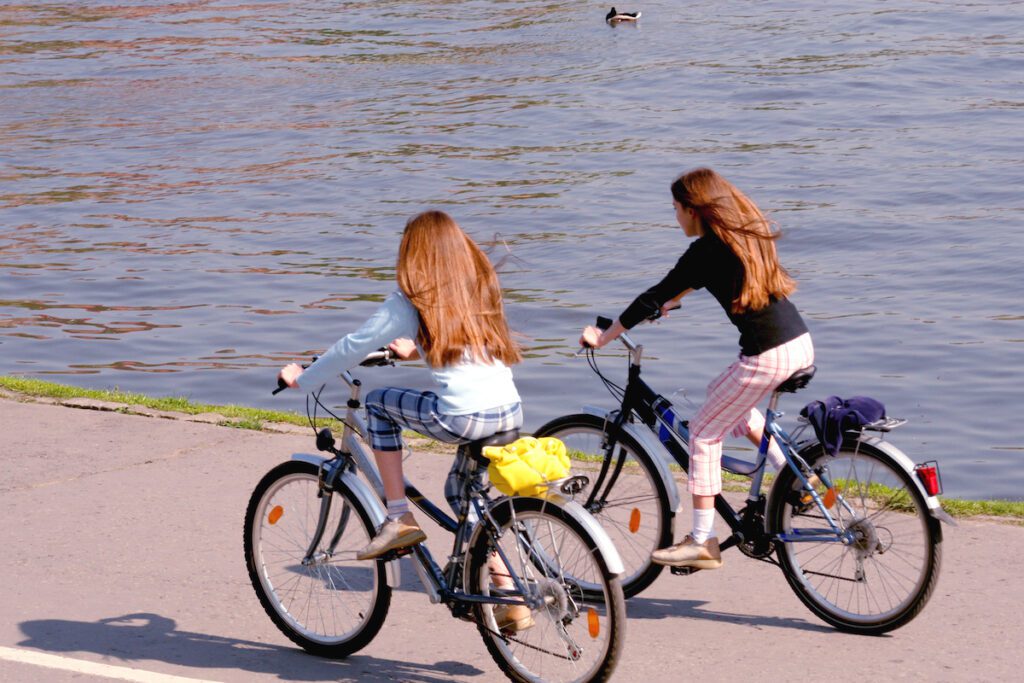 girls riding bikes