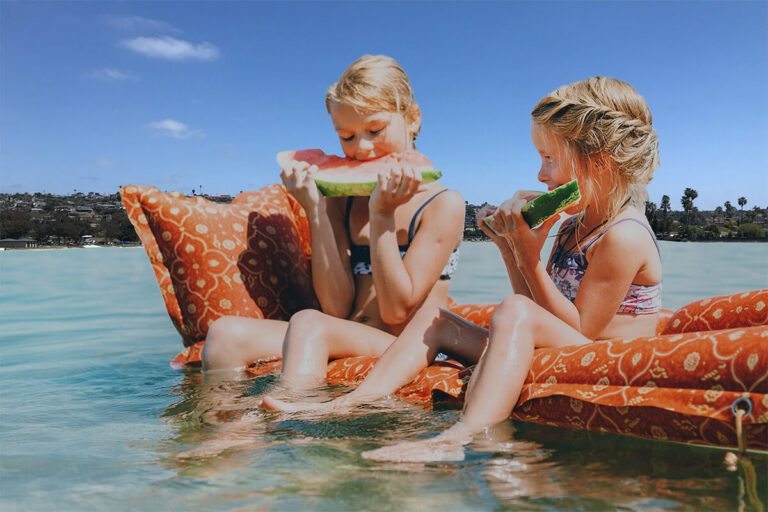 Girls on float at De Anza Cove