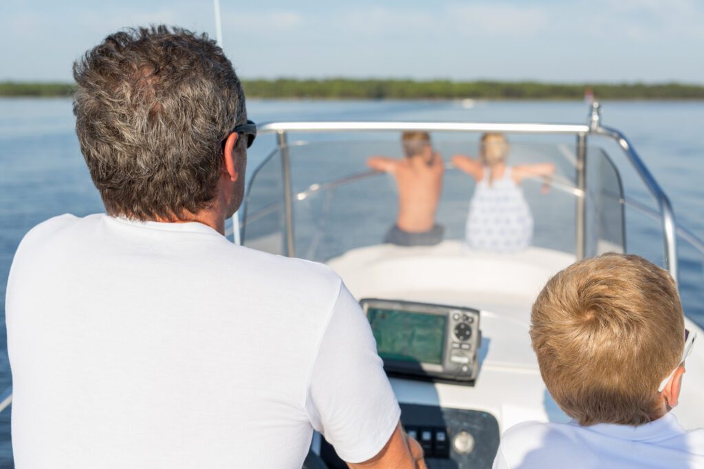 dad and family boating