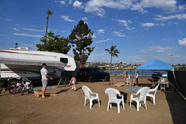 beachfront unpaved site with family