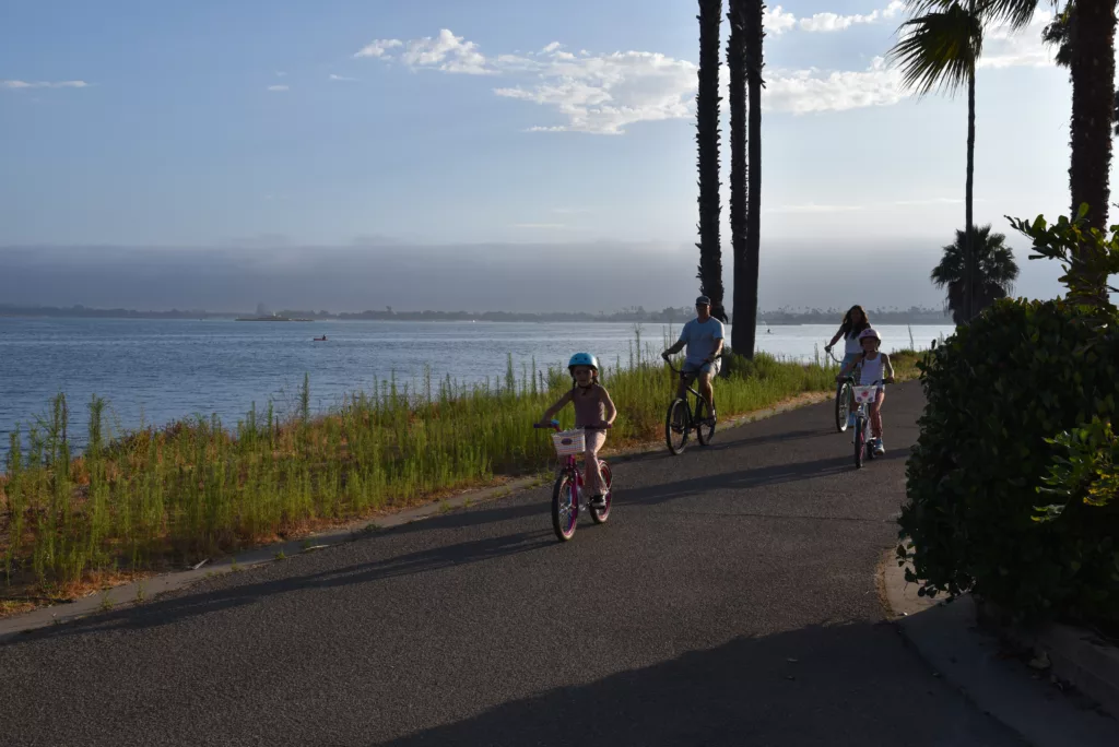 family biking after parents worked remotely